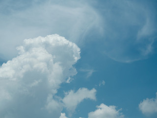 Cumulus cloud on beautiful blue sky in day light , Fluffy clouds formations at tropical zone