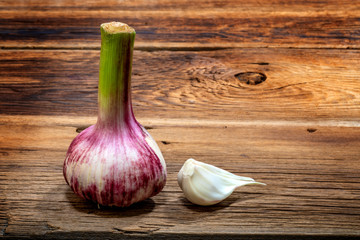 young garlic on a wooden table