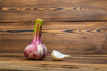 young garlic on a wooden table