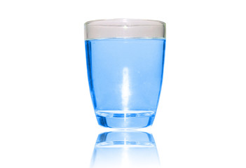 blue liquid in clear glass isolated on white background with bright shadow . healthcare drinking...