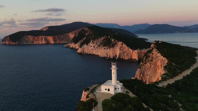 Orange sunset  in Cape Doukato. Lefkada island, Greece, Lighthouse view 4k