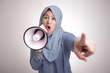 Asian muslim woman Shouting with Megaphone, Leader, Supporter or Protester