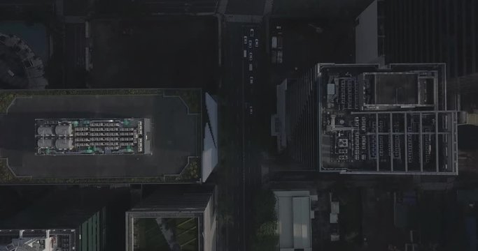 Ungraded, Bird's eye view, Morning aerial flight over high rise buildings following traffic line. Drone, 4K.