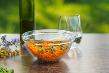 carrot salad and beans on a bould