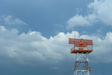 Airport radar red-and-white with rain clouds background