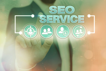 Handwriting text writing Seo Service. Conceptual photo techniques and procedures to increase the...