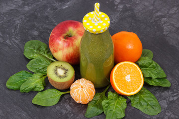 Freshly blended coctail from fruits and vegetables as healthy dessert containing vitamins and...