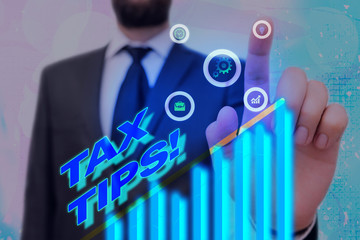 Word writing text Tax Tips. Business photo showcasing compulsory contribution to state revenue...