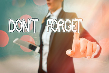 Writing note showing Dont Forget. Business concept for used to remind someone about an important...