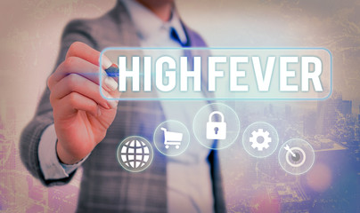 Writing note showing High Fever. Business concept for medical condition which the body temperature...
