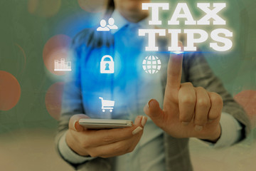 Word writing text Tax Tips. Business photo showcasing compulsory contribution to state revenue...