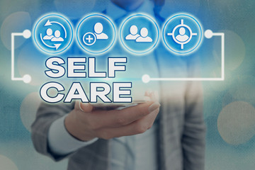 Text sign showing Self Care. Business photo showcasing the practice of taking action to improve one...