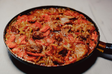 food fried stew meat stew vegetables tasty beautifully close in the pan

