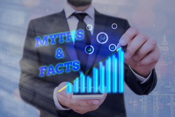Word writing text Myths And Facts. Business photo showcasing usually traditional story of...