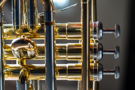 Close up of the valves of a Cornet brass instrument