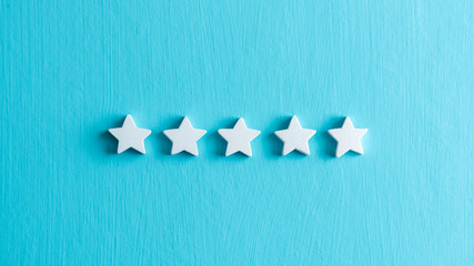 5 star rating customers satisfaction, white stars on light blue background.