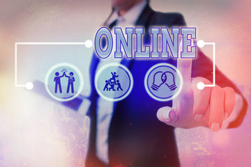 Conceptual hand writing showing Online. Concept meaning the computer or device connected to a...