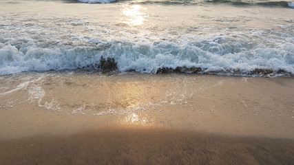 waves and sand