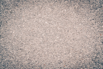 Texture drop of small grey stone pavement surface. Multipurpose backdrop. Toned image, place for text