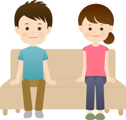 距離をとって座る男女