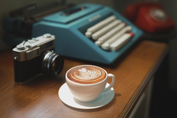 Coffee latte art in vintage cafe - 351117486