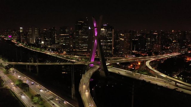 The Octavio Frias de Oliveira bridge or Ponte Estaiada cable stayed suspension bridge built over the Pinheiros River in the city of Sao Paulo, Brazil. Aerial Hyper lapse