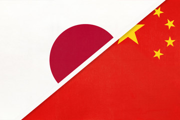 Japan and China symbol of two national flags. Relationship between Asian countries.