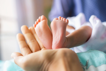 Obraz na płótnie Canvas Cute asian baby newborn close up