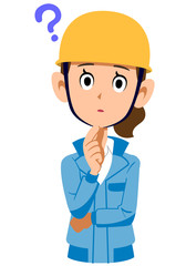 疑問を持つヘルメットを被った青い作業着の女性
