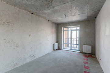 Russia, Moscow- January 25, 2020: interior room apartment rough repair for self-finishing. interior decoration, bare walls of the room, stage of construction