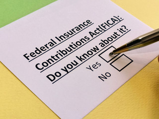 Obraz premium A person is answering question about federal insurance contributions act (FICA).