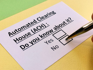 Obraz premium A person is answering question about automated clearing house.