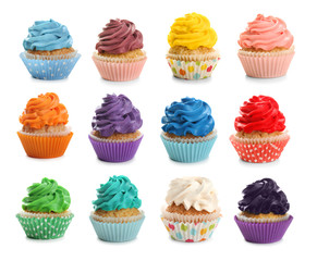 Many colorful cupcakes on white background