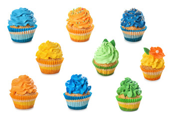 Many tasty colorful cupcakes on white background