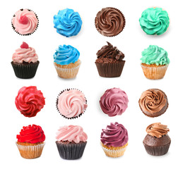 Many tasty colorful cupcakes on white background