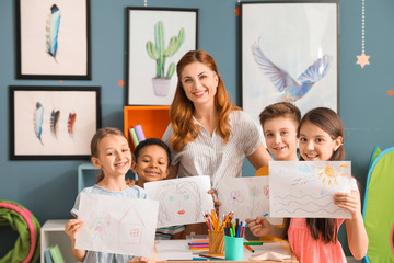 Drawing teacher giving classes at school