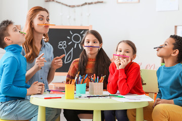 Drawing teacher giving classes at school