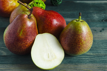 large juicy pears on wooden backgrounds close up