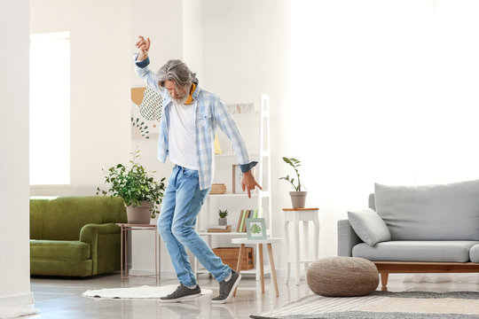 Cool Senior Man Dancing At Home