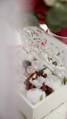 Obraz na płótnie Canvas Wedding box with flowers and rings. 