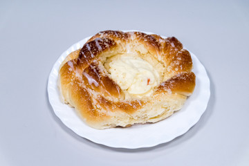 Sweet bun with cottage cheese.