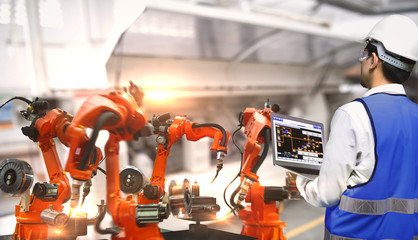 The robot arms is used for arc welding industry,Technical engineer are control robotics features...