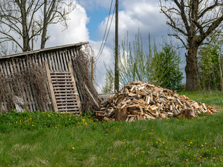a simple wooden shed in the yard