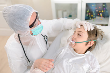 Doctor Intubating a Kid Having a Respiratory Desease