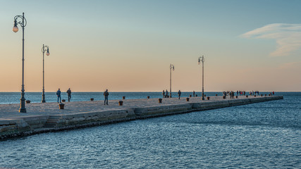 The Molo Audace pier of Trieste in a winter evening