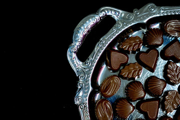 chocolate serving on silver tray. to serve chocolate on tray is a traditional Turkish hospitality sign. 