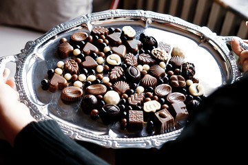 chocolate serving on silver tray. to serve chocolate on tray is a traditional Turkish hospitality sign. 