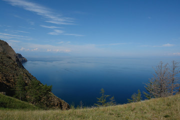 Beautiful view of Lake Baikal from the Cape Khoboy on a summer sunny day (Olkhon Island, Siberia, Russia)