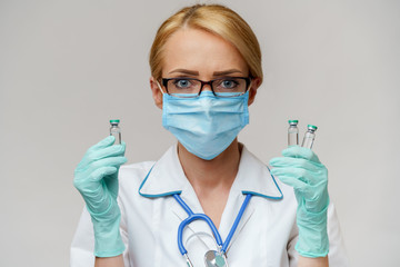 health medical worker woman holding tube with vaccine