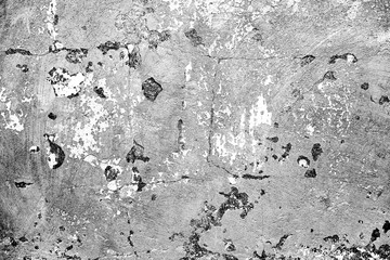 Texture of a concrete wall with cracks and scratches which can be used as a background